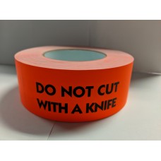 Label 2" x 5" DO NOT CUT WITH A KNIFE  Fl.Red (500/rl)